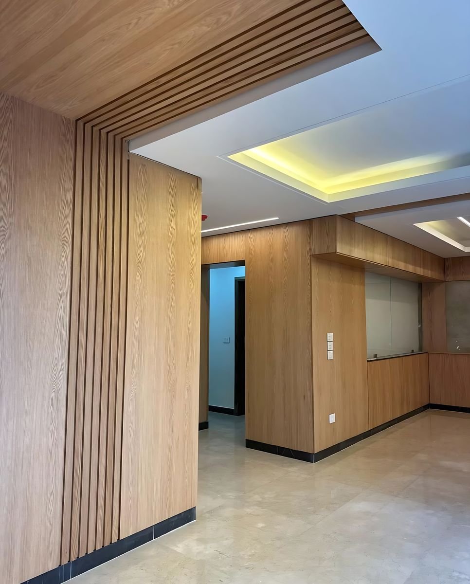 Oak slat returns along a corridor