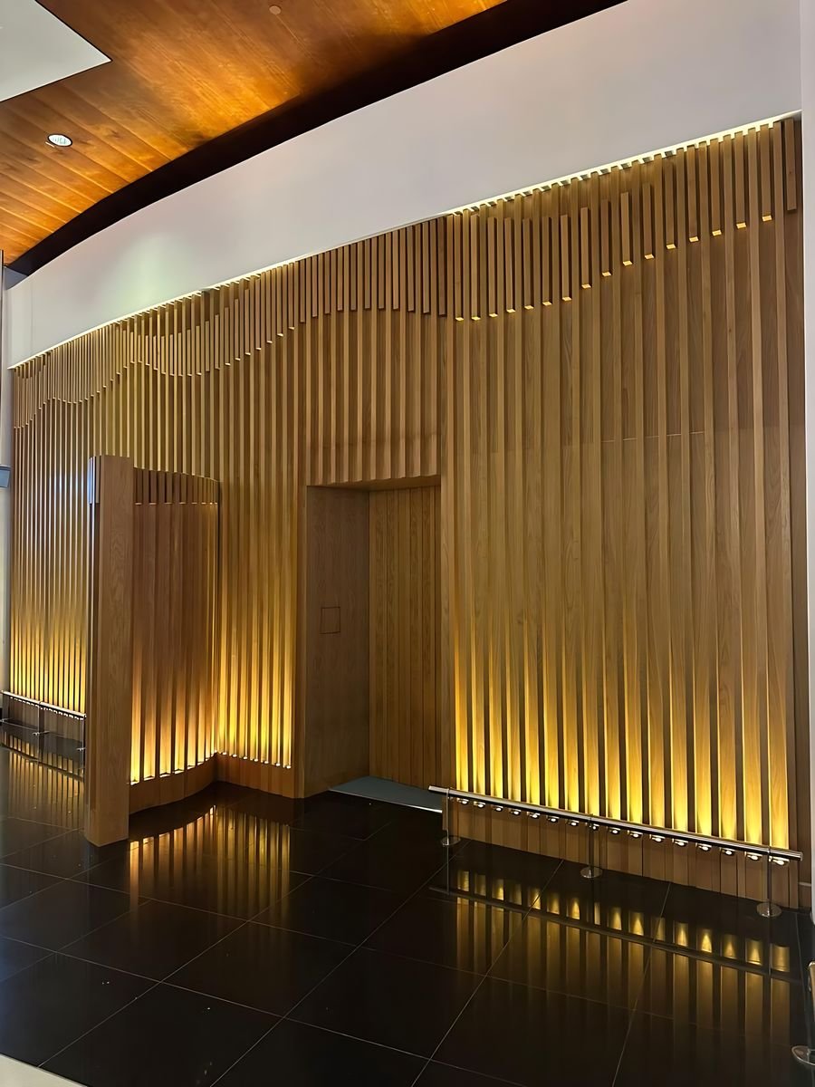 Oak slat wave under a timber ceiling