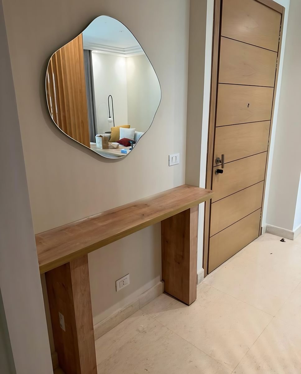 Oak console, sculpted mirror, panelled door
