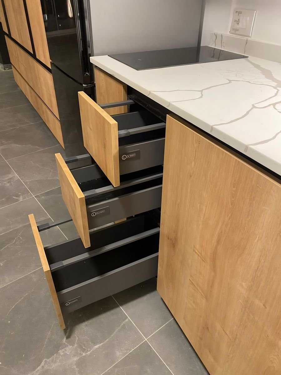 Oak drawers on soft-close runners, quartz top