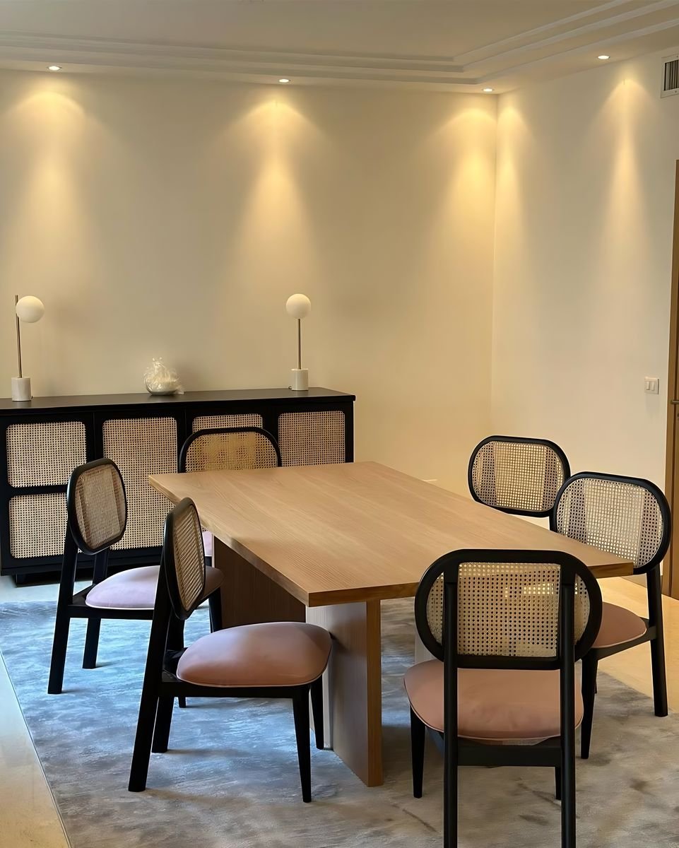 Oak dining table and rattan-front sideboard