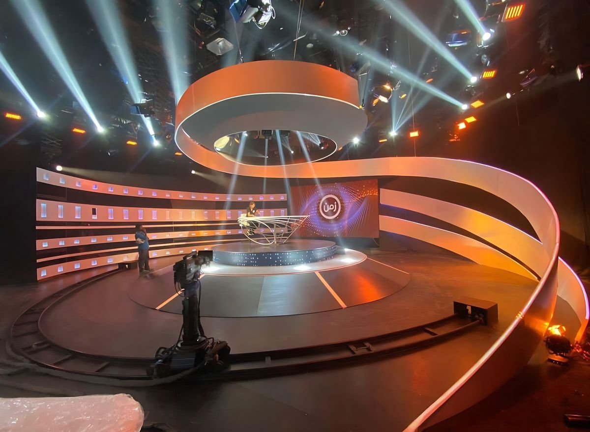 Television studio set, curved light ribbons